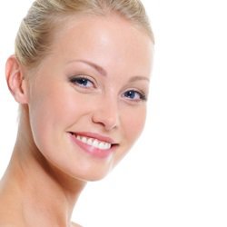 Facelift female patient model grinning