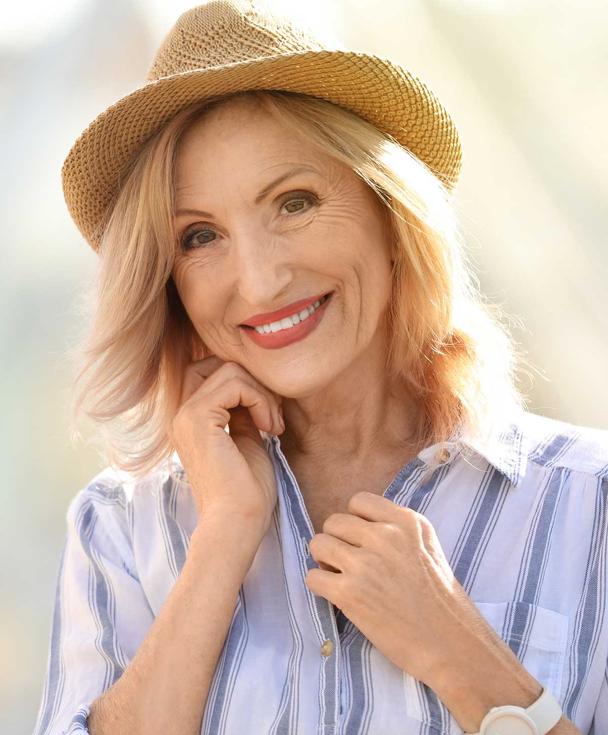 Beverly Hills Facelift patient in a hat